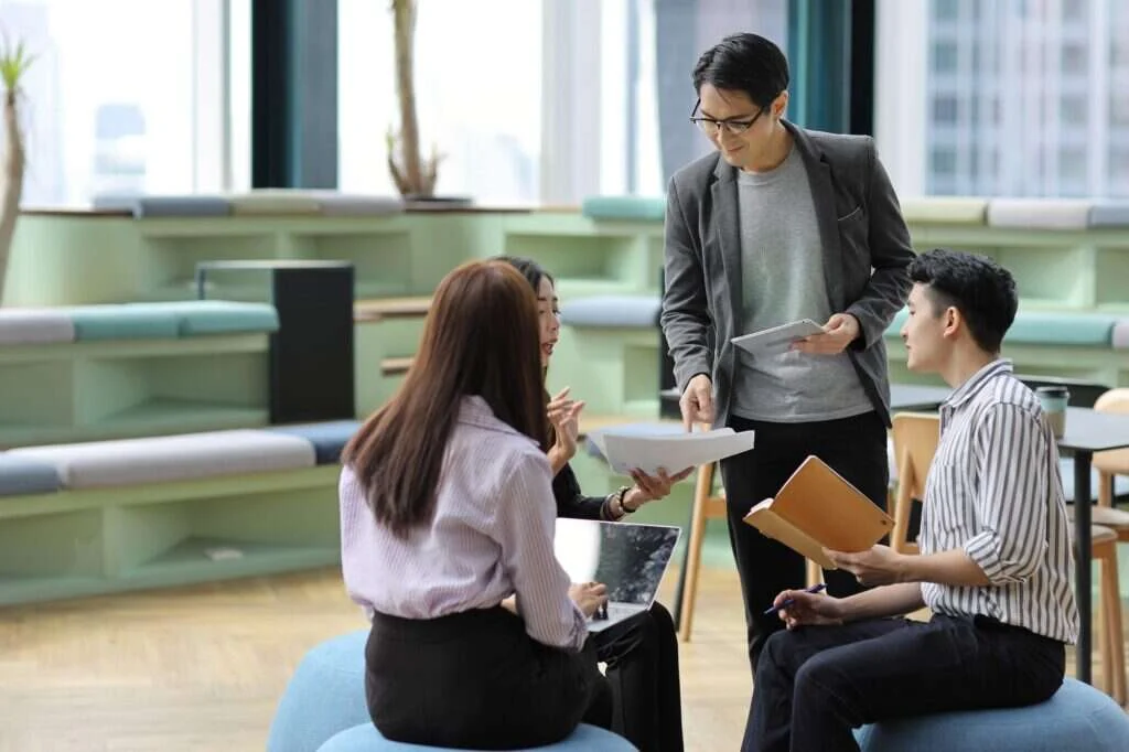 His Word team members working together in the Clark office