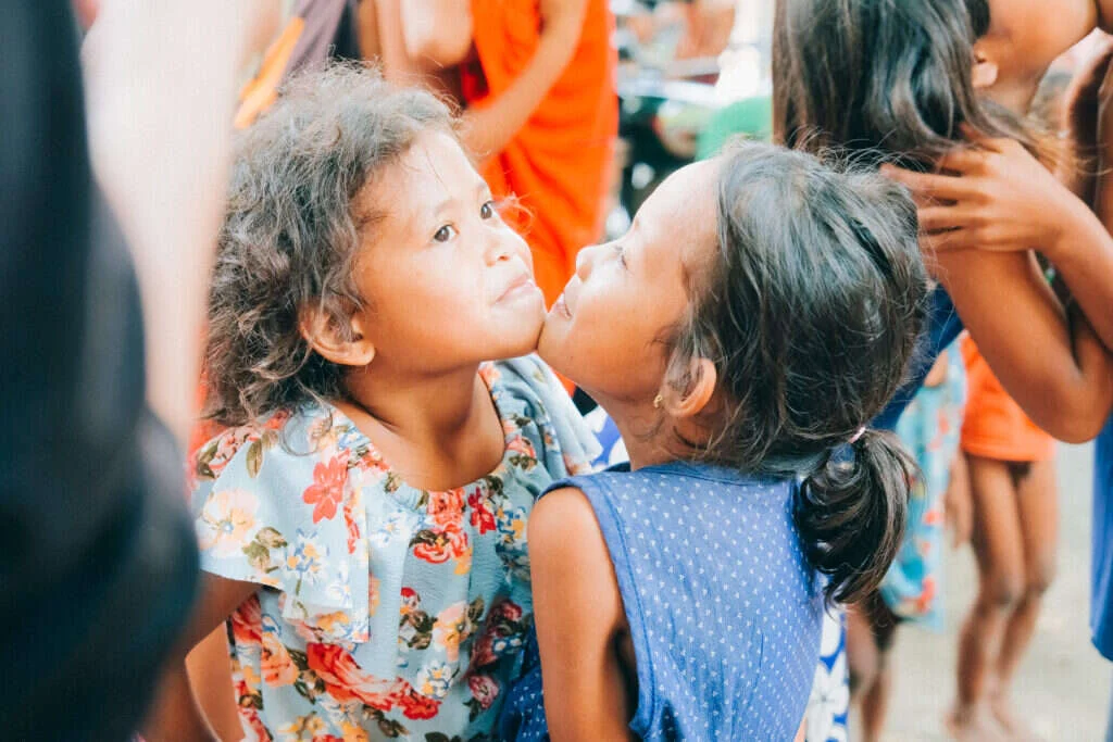 Two girls nose to nose during a game